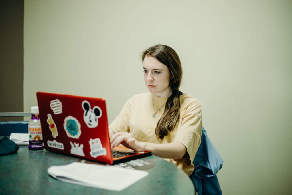Toccoa Falls College female student using her laptop