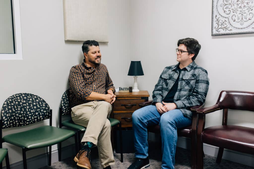 Two people in a counseling session.