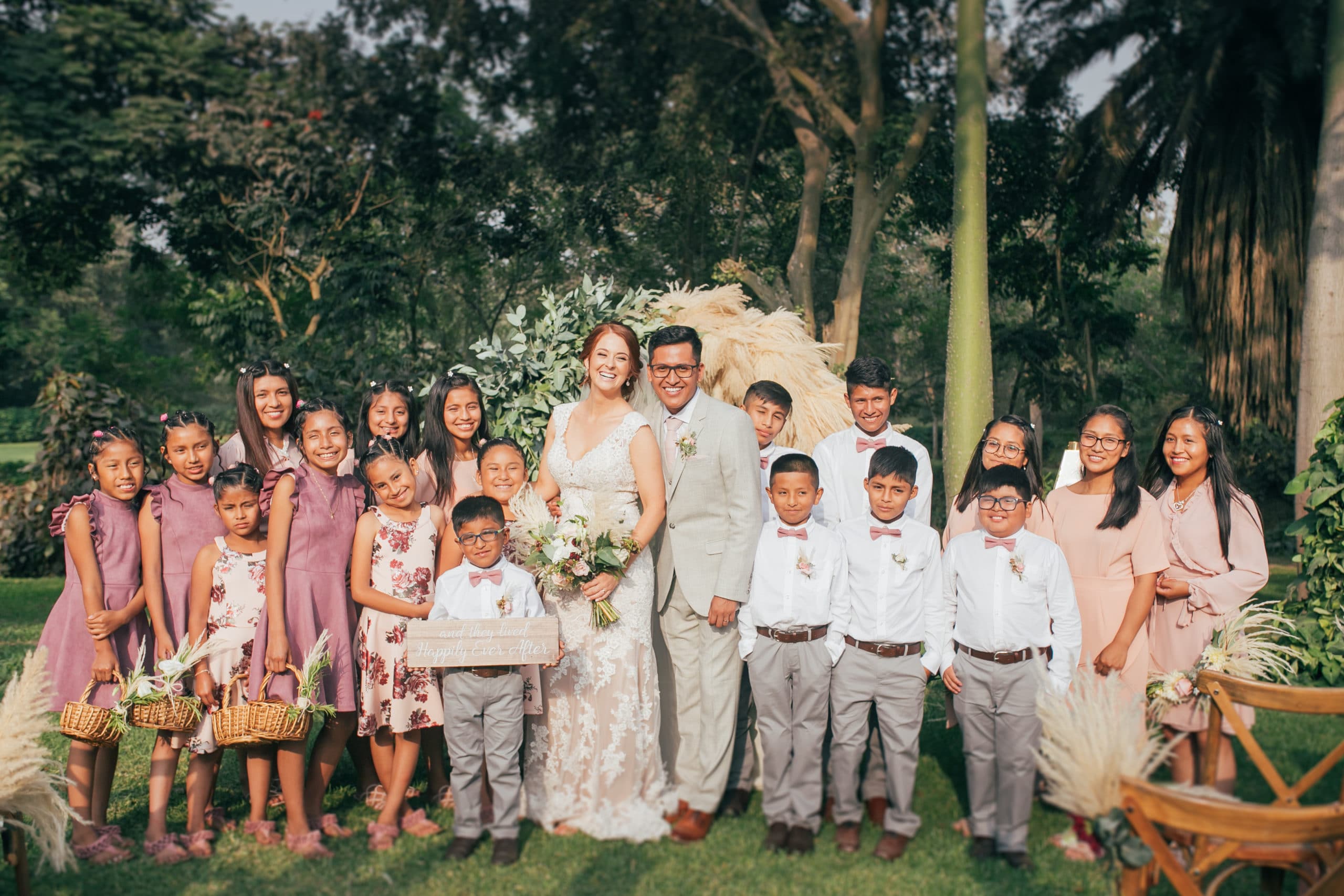 TFC Alumni Amber Carrion and husband Abel wedding photo with kids from Refuge of Hope