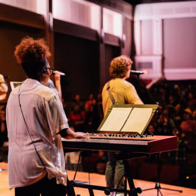 A young lady playing the piano